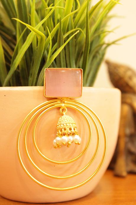 Baby Pink Natural Gemstones Embedded Gold Finish Concentric Circles Jhumka Earrings