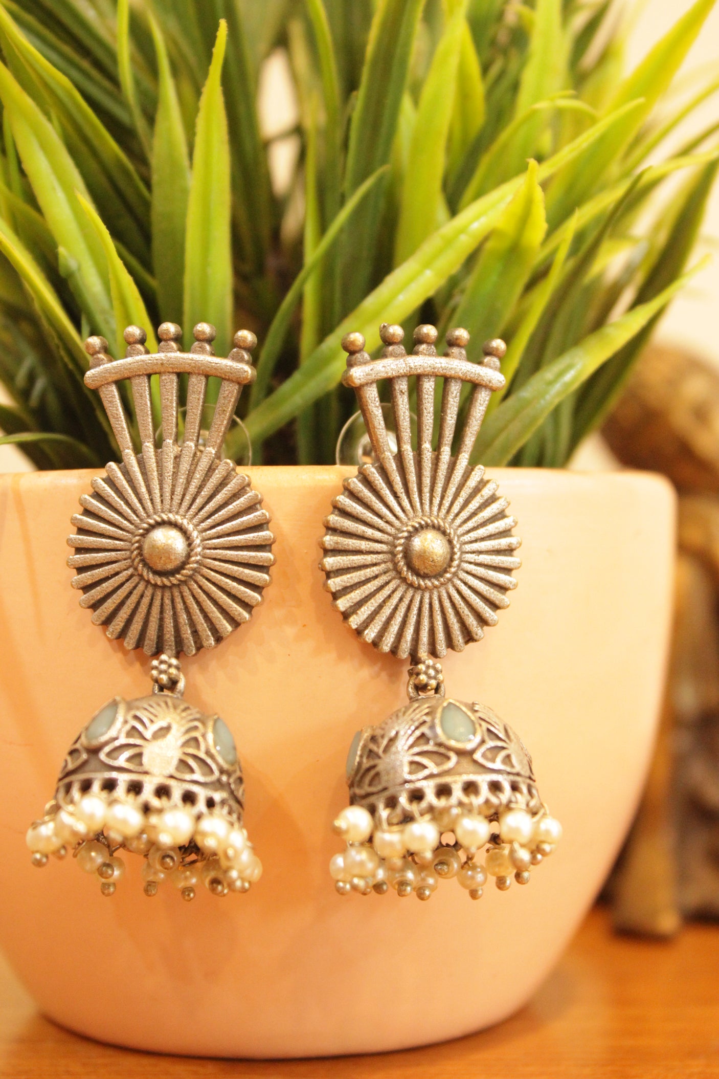 Chakra Motif Turquoise Stones Embedded Jhumka Earrings