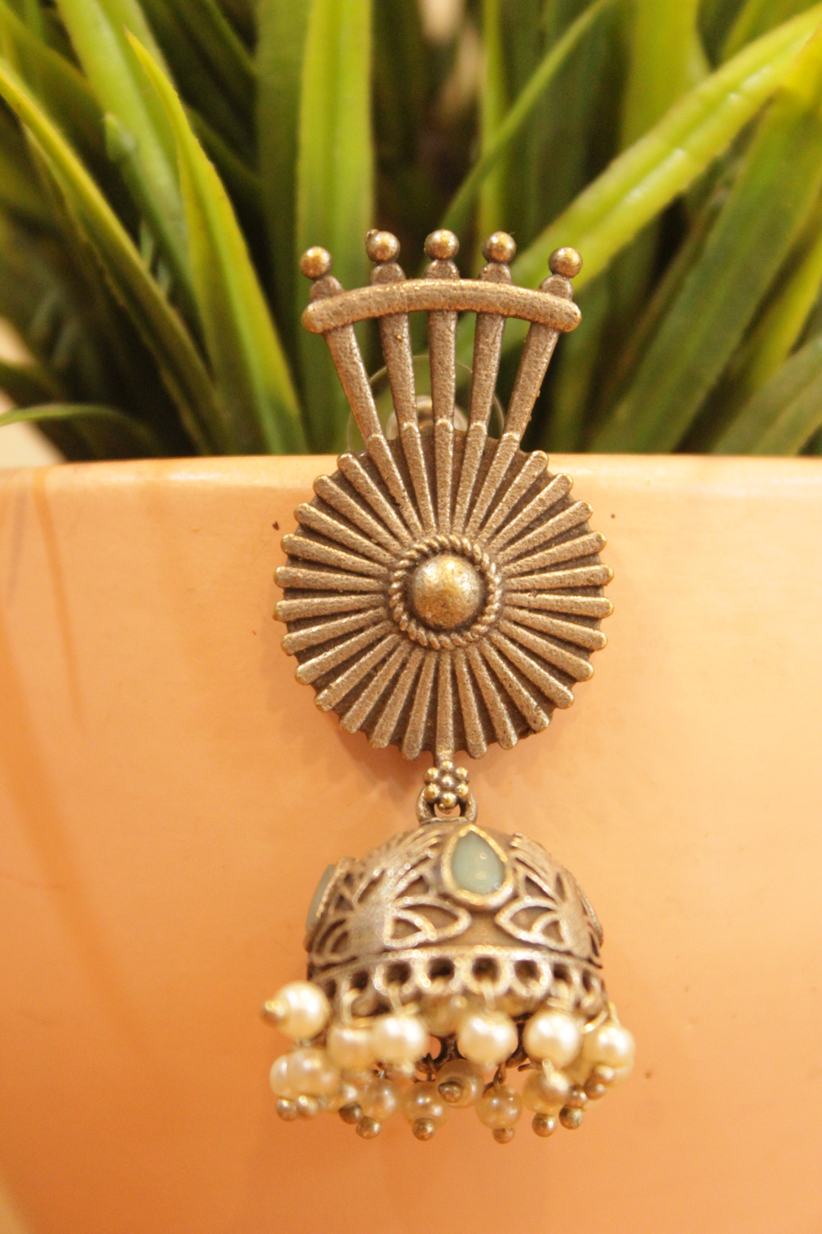Chakra Motif Turquoise Stones Embedded Jhumka Earrings