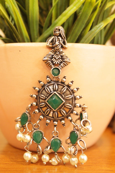 Green Stones Embedded Chakra Motif Oxidised Finish Earrings