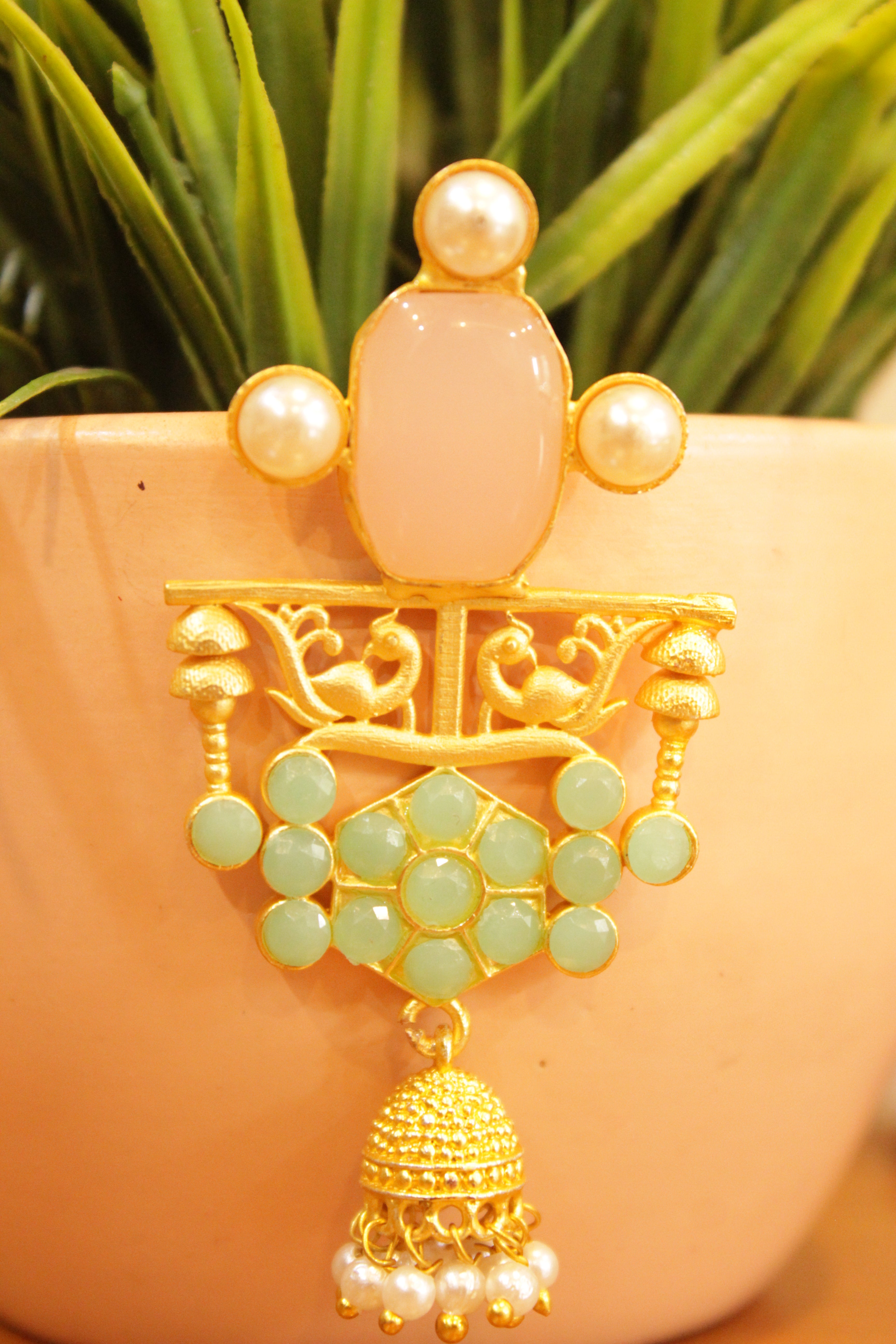 Baby Pink & Turquoise Natural Gemstones Embedded Gold Finish Jhumka Earrings