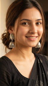 Buddha Motif Oxidised Finish Jhumka Earrings