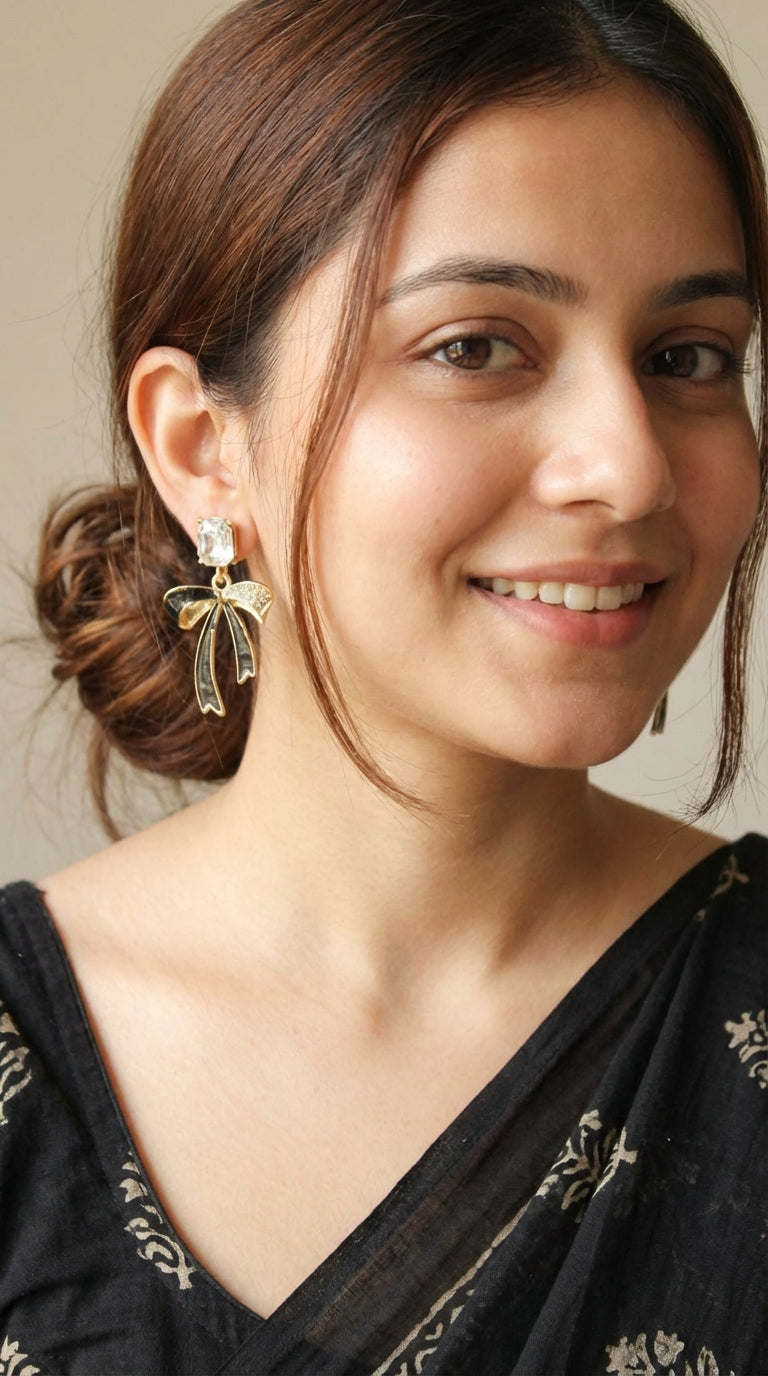 Bow Shaped Gold Toned Glass Stone Embedded Stud Earrings