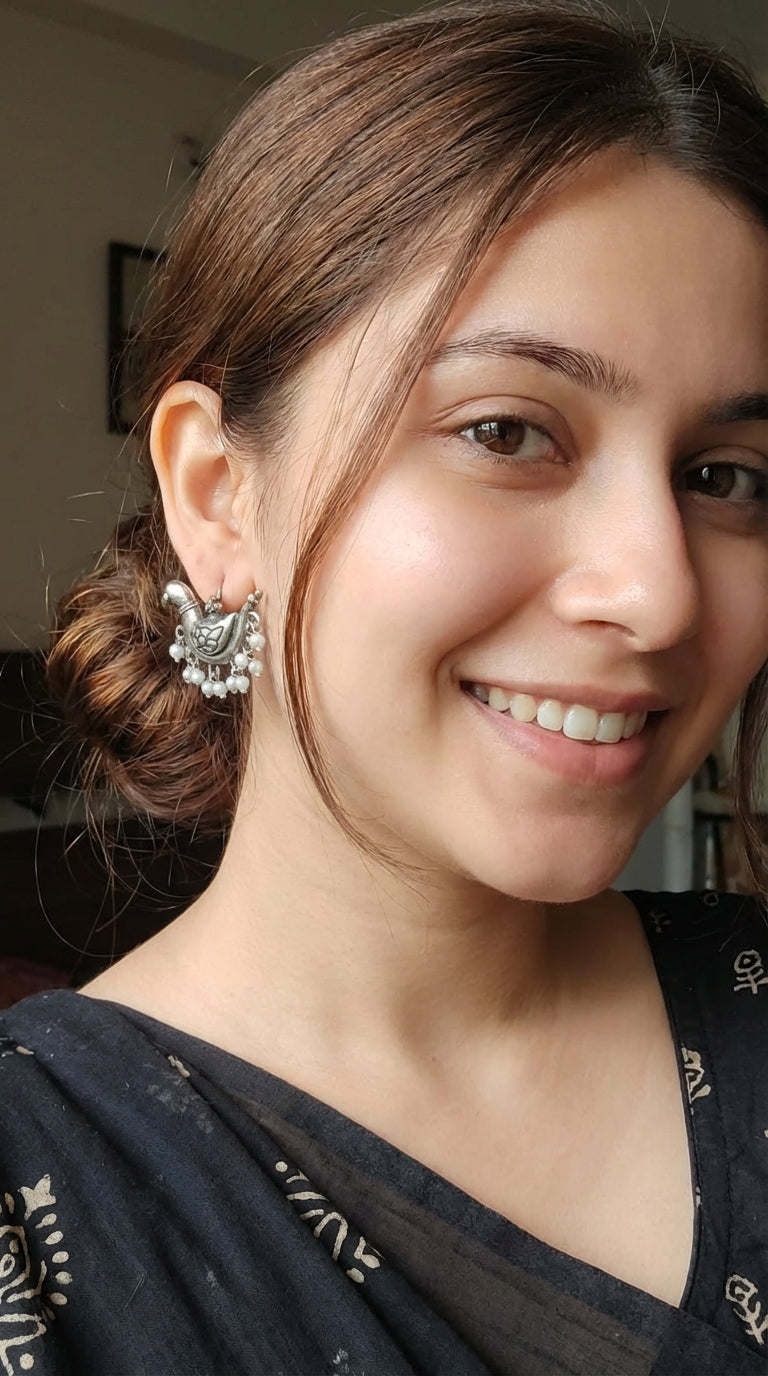 Intricately Crafted Peacock Earrings with White Beads