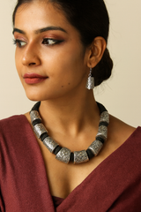 Intricately Detailed Metal Accents Braided with Black Fabric Threads Necklace Set