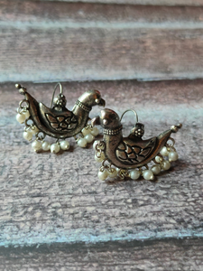 Intricately Crafted Peacock Earrings with White Beads