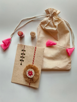 Load image into Gallery viewer, Eco-Friendly Handmade Jute Flower Rakhi with Dried Leaves and Flower Petals (Comes with a Reusable Cloth Pouch and Recycled Paper Card)
