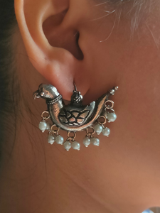 Intricately Crafted Peacock Earrings with White Beads