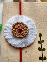 Load image into Gallery viewer, Eco-Friendly Handmade Jute &amp; Cloth Rakhi with Dried Leaves and Flower Petals (Comes with a Reusable Cloth Pouch and Recycled Paper Card)
