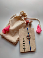 Load image into Gallery viewer, Eco-Friendly Handmade Jute &amp; Thread Rakhi with Dried Leaves and Flower Petals (Comes with a Reusable Cloth Pouch and Recycled Paper Card)
