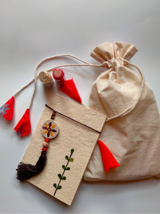 Eco-Friendly Handmade Jute Lumba Rakhi with Dried Leaves and Flower Petals (Comes with a Reusable Cloth Pouch and Recycled Paper Card)