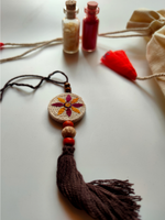 Load image into Gallery viewer, Eco-Friendly Handmade Jute Lumba Rakhi with Dried Leaves and Flower Petals (Comes with a Reusable Cloth Pouch and Recycled Paper Card)
