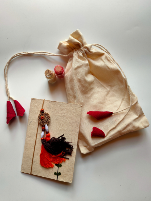 Eco-Friendly Handmade Jute & Thread Lumba Rakhi with Dried Leaves and Flower Petals (Comes with a Reusable Cloth Pouch and Recycled Paper Card)