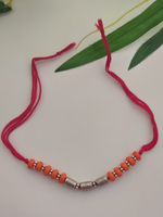 Load image into Gallery viewer, Orange Wooden Beads and Metal Beads Rakhi with Pink Cotton Thread
