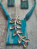Load image into Gallery viewer, Ikat Printed Fabric Necklace Set with Metal Leaves Detailing
