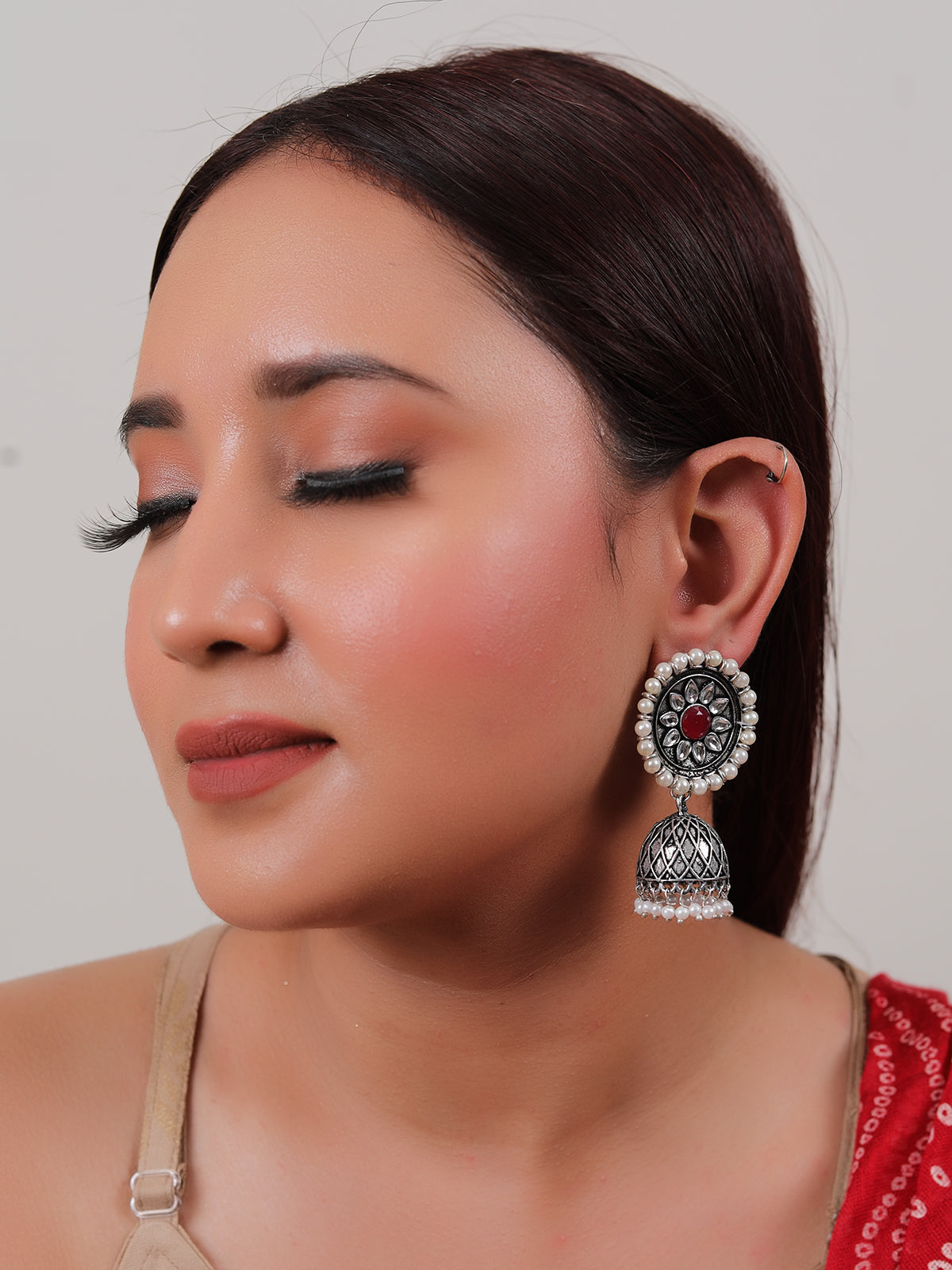 Kundan Stones Embedded Flower Shape Premium Oxidised Finish Jhumka Earrings