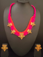 Load image into Gallery viewer, Red &amp; Pink Braided Fabric Threads Necklace Set with Antique Gold Finish Metal Charms
