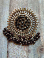 Load image into Gallery viewer, Sun Shaped Metal Earrings with Concentric Circles and Black Beads

