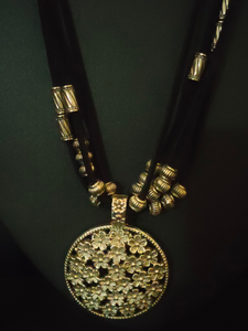 4 Layer Necklace Set with Intricately Detailed Metal Pendant