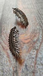 Load image into Gallery viewer, Feather Shaped Metal Earrings
