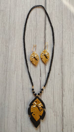 Load image into Gallery viewer, Elegant Leaf Shape Black &amp; Golden Handcrafted Terracotta Clay Necklace Set
