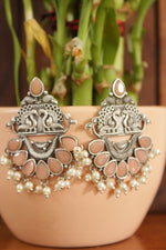 Load image into Gallery viewer, Peach Glass Stones Embedded Peacock Motifs Detailed Brass Earrings
