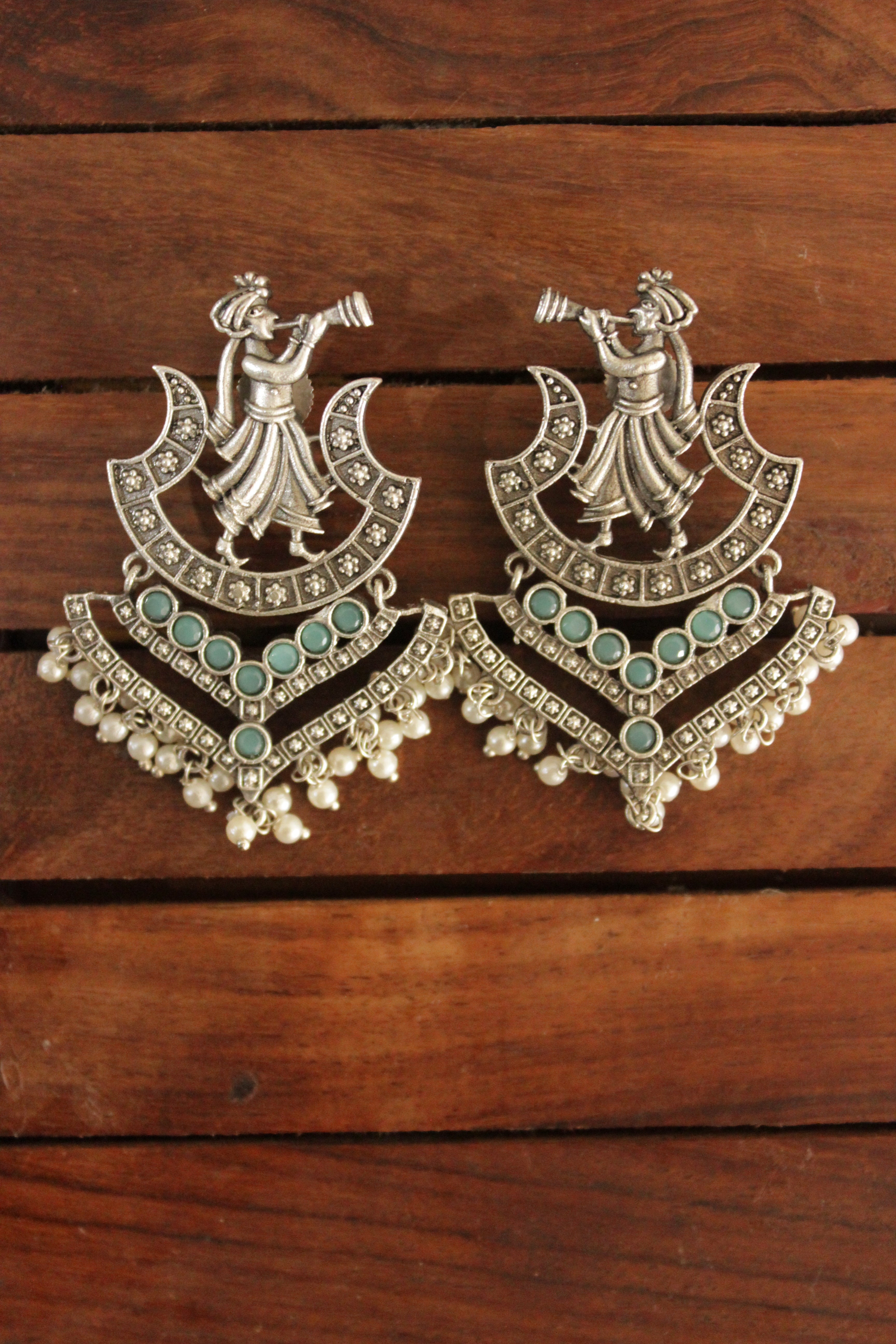 Turquoise Glass Stones Embedded Wedding Shehnai Motif Oxidised Finish Brass Earrings
