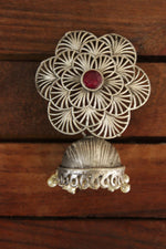 Load image into Gallery viewer, Detailed Jaali Pattern Flower Stud Silver Finish Jhumka Earrings with Red Center Stone
