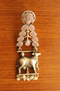 Pink Glass Stones Embedded Cow Motif Oxidised Finish Brass Dangler Earrings