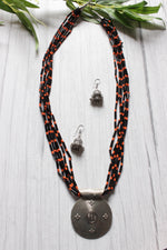 Load image into Gallery viewer, Black and Orange Glass Beaded Warrior Pendant Necklace Set
