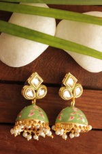 Load image into Gallery viewer, Kundan Stones Embedded Gold Toned Hand Painted Green Meenakari Jhumka Earrrings
