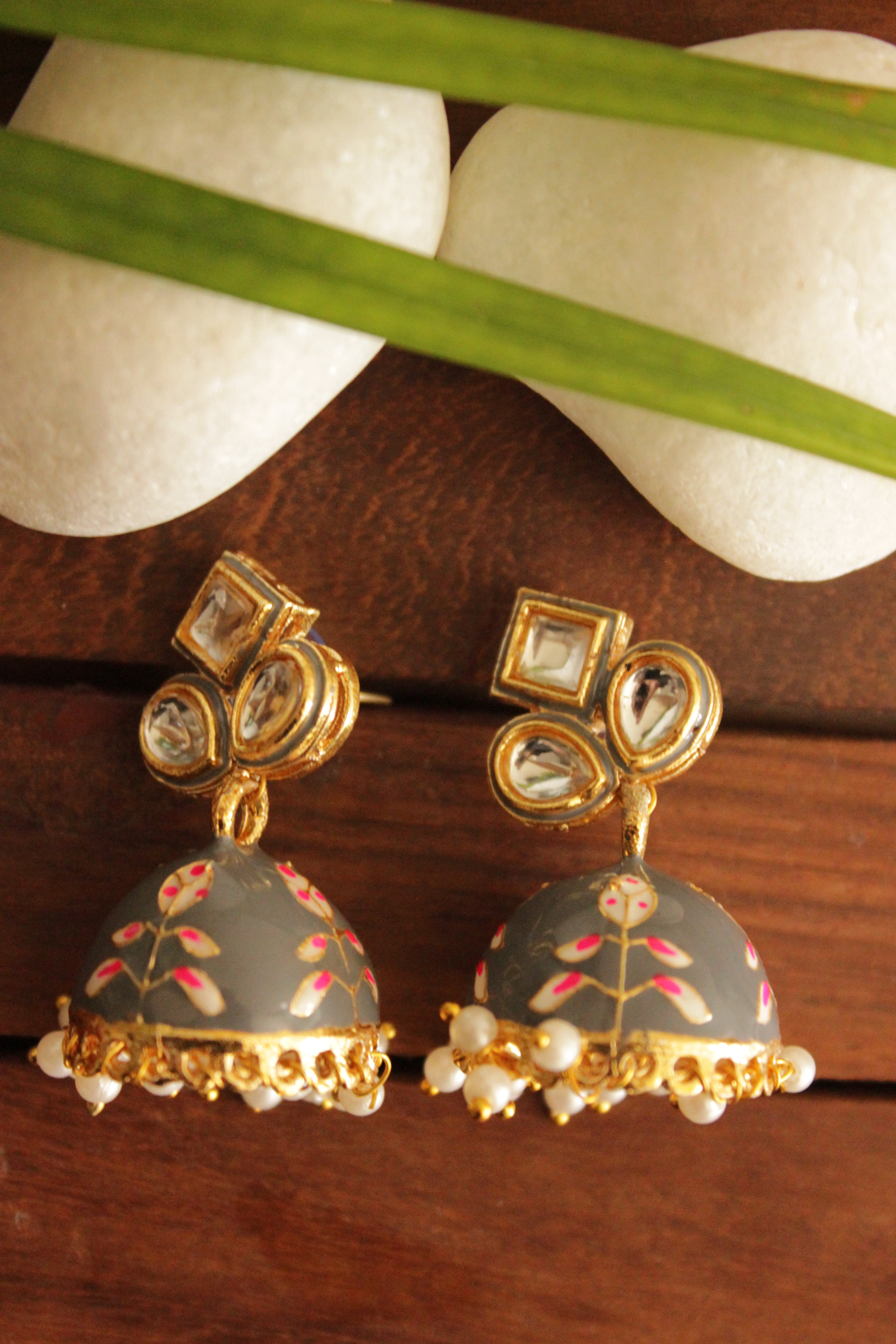Kundan Stones Embedded Gold Toned Hand Painted Dark Grey Meenakari Jhumka Earrrings