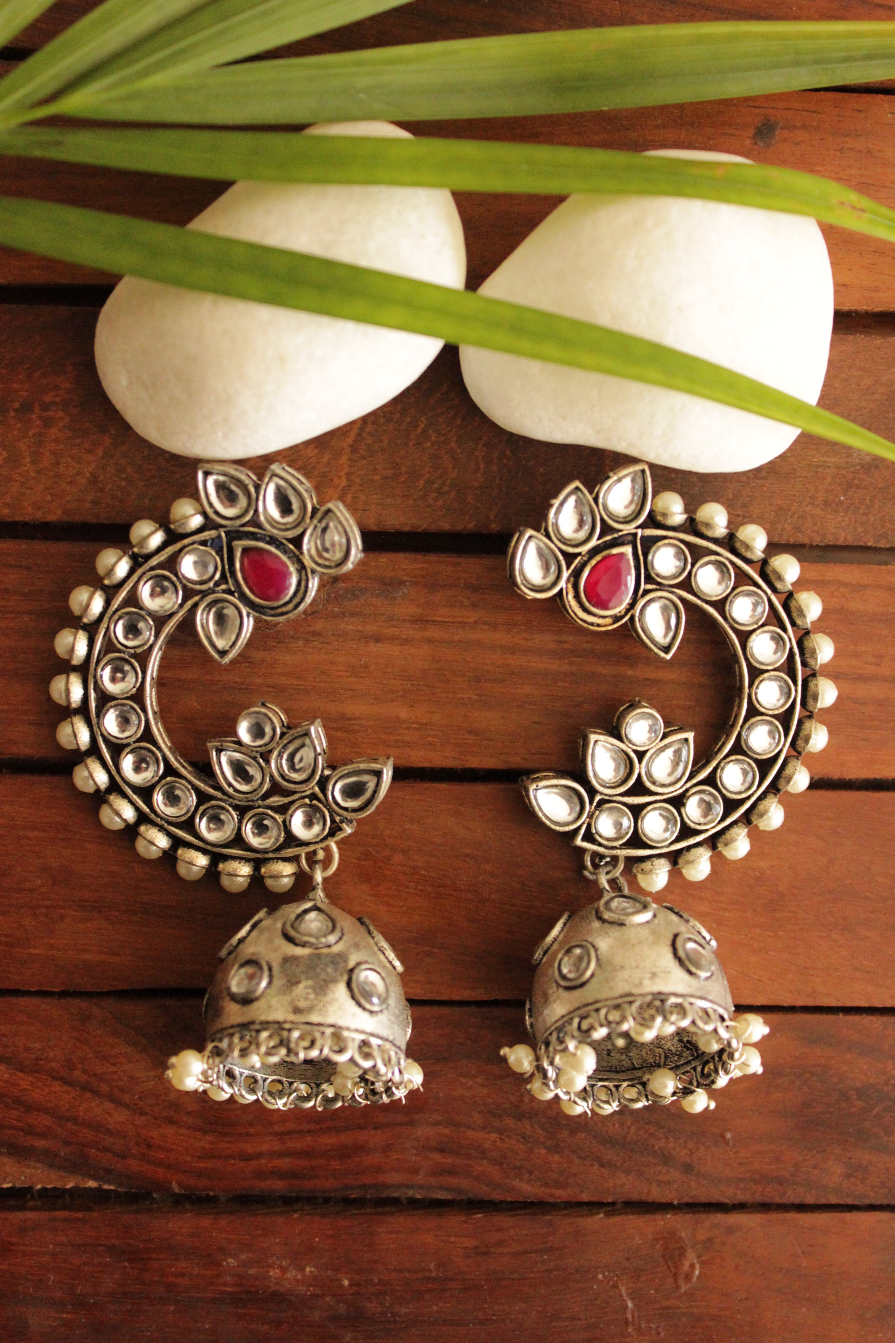 Kundan Stones Embedded Peacock Shape Premium Oxidised Finish Jhumka Earrings