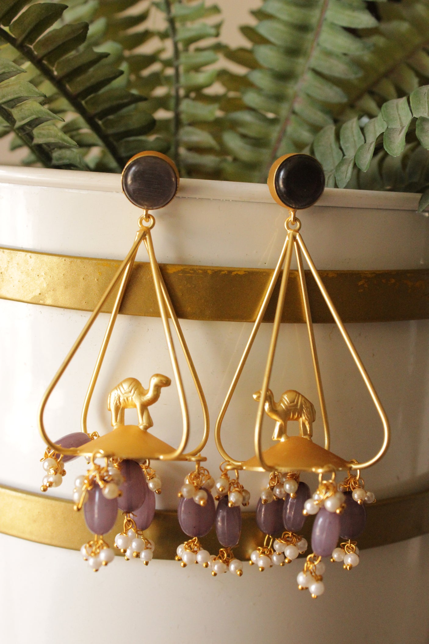Camel Motif Gold Finish Brass Dangler Earrings Accentuated with Purple Grey Beads