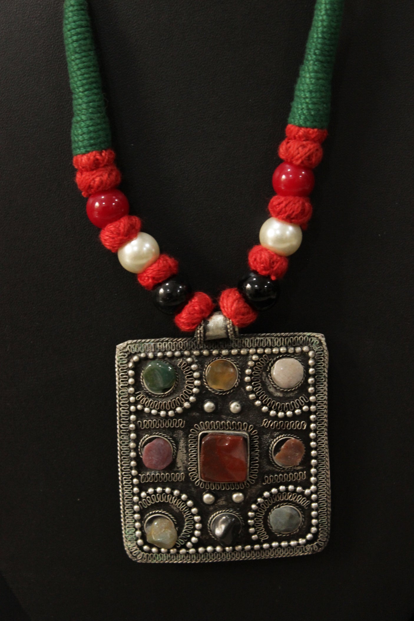 Natural Stones Embedded Oxidised Finish Afghani Pendant Braided Threads Necklace Set
