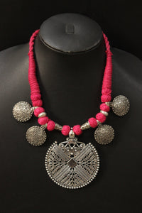 Intricately Detailed Metal Pendant and Charms Pink Thread Braided Necklace