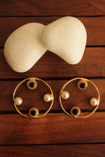 Load image into Gallery viewer, Black Evil Eye and Pearl Embedded Gold Finish Hoop Earrings
