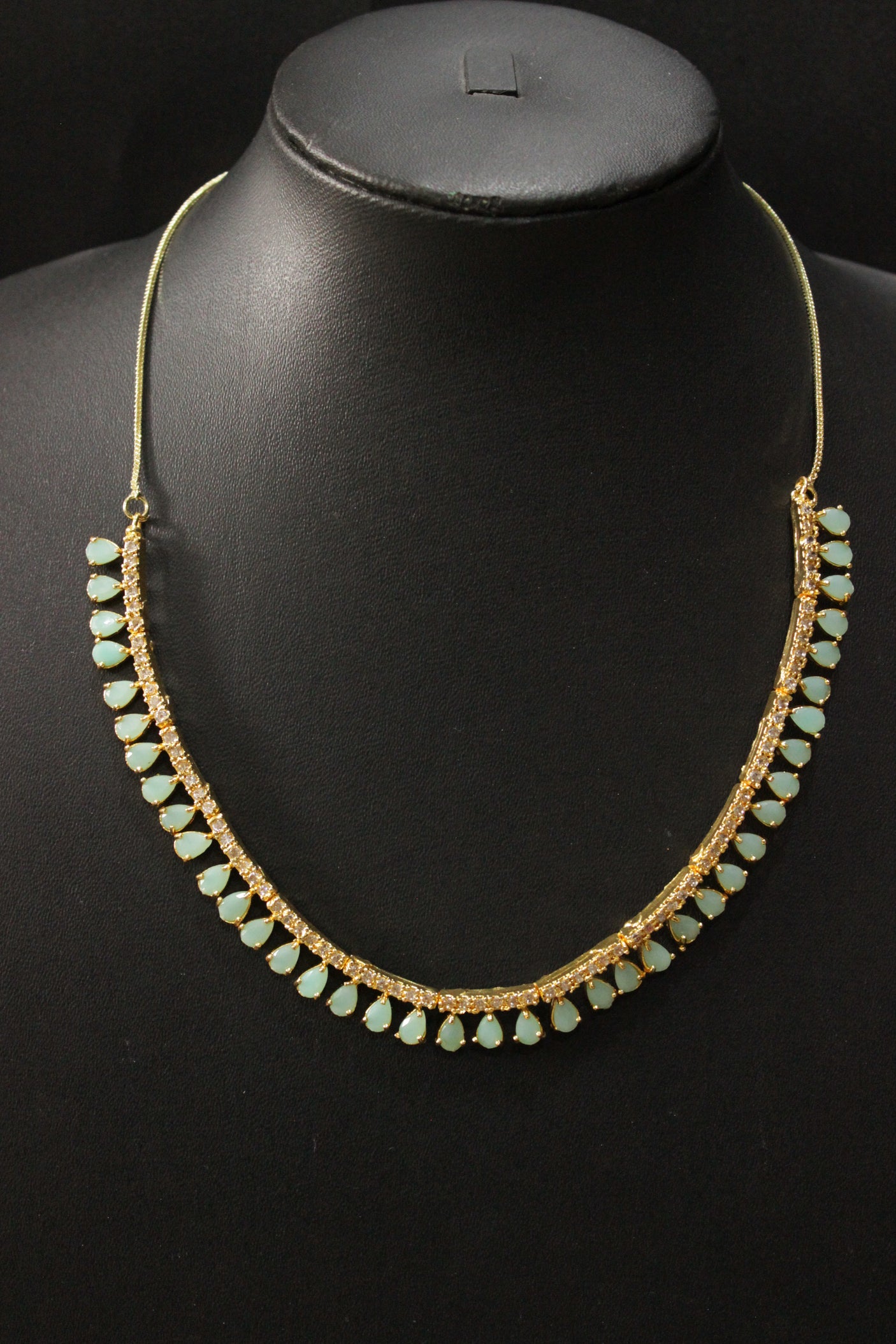 Turquoise Stones and American Diamond Studded Delicate Gold Finish Necklace Set