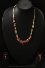 Load image into Gallery viewer, Red Ruby Stones and American Diamond Studded Delicate Gold Finish Necklace Set with Dangler Earrings
