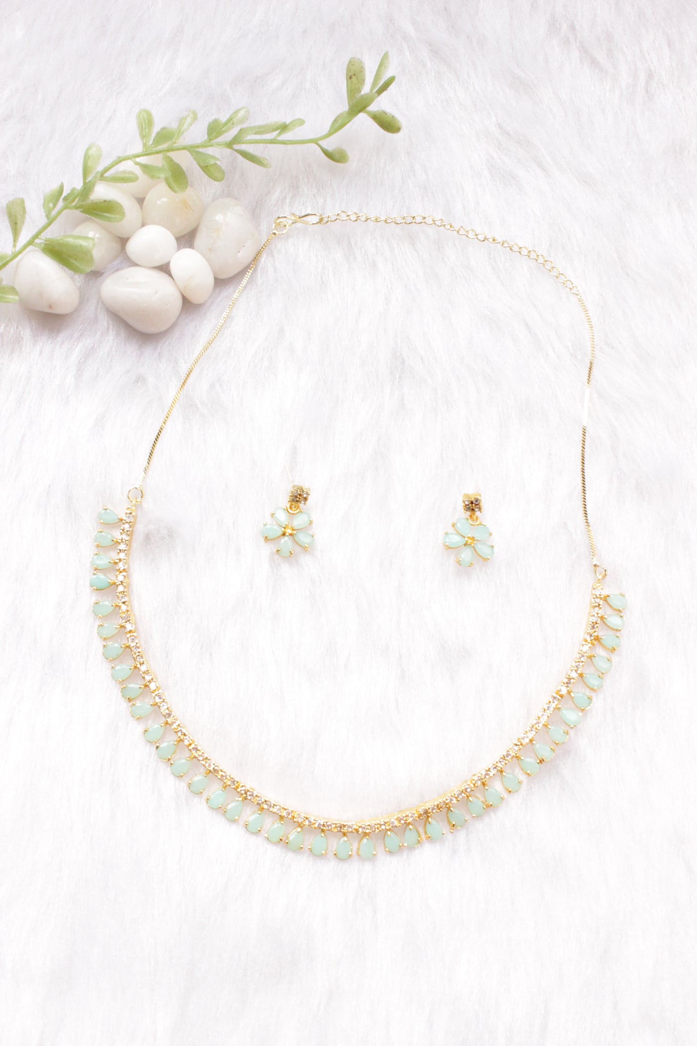 Turquoise Stones and American Diamond Studded Delicate Gold Finish Necklace Set