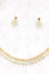Turquoise Stones and American Diamond Studded Delicate Gold Finish Necklace Set