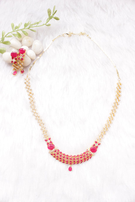 Red Ruby Stones and American Diamond Studded Delicate Gold Finish Necklace Set with Dangler Earrings