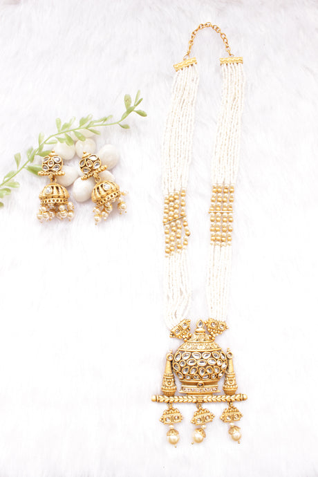Kundan Stones Embedded Kalash Motif Matt Gold Finish Multi-Layer White Beads Long Necklace Set with Jhumka Earrings