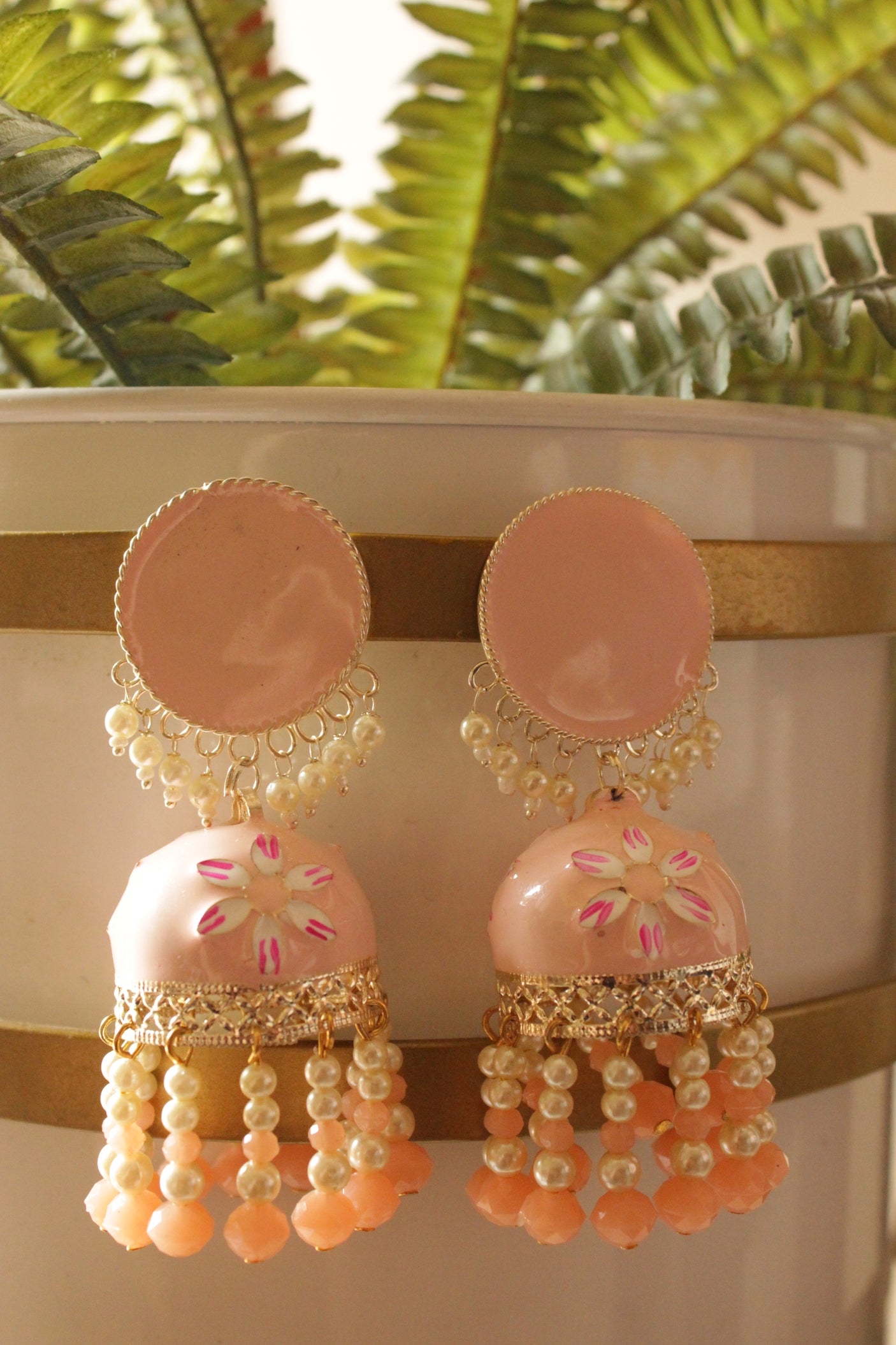 Peach Hand Painted Meenakari Work Gold Toned Hoop Jhumka Earrings Accentuated Stringed Beads Danglers