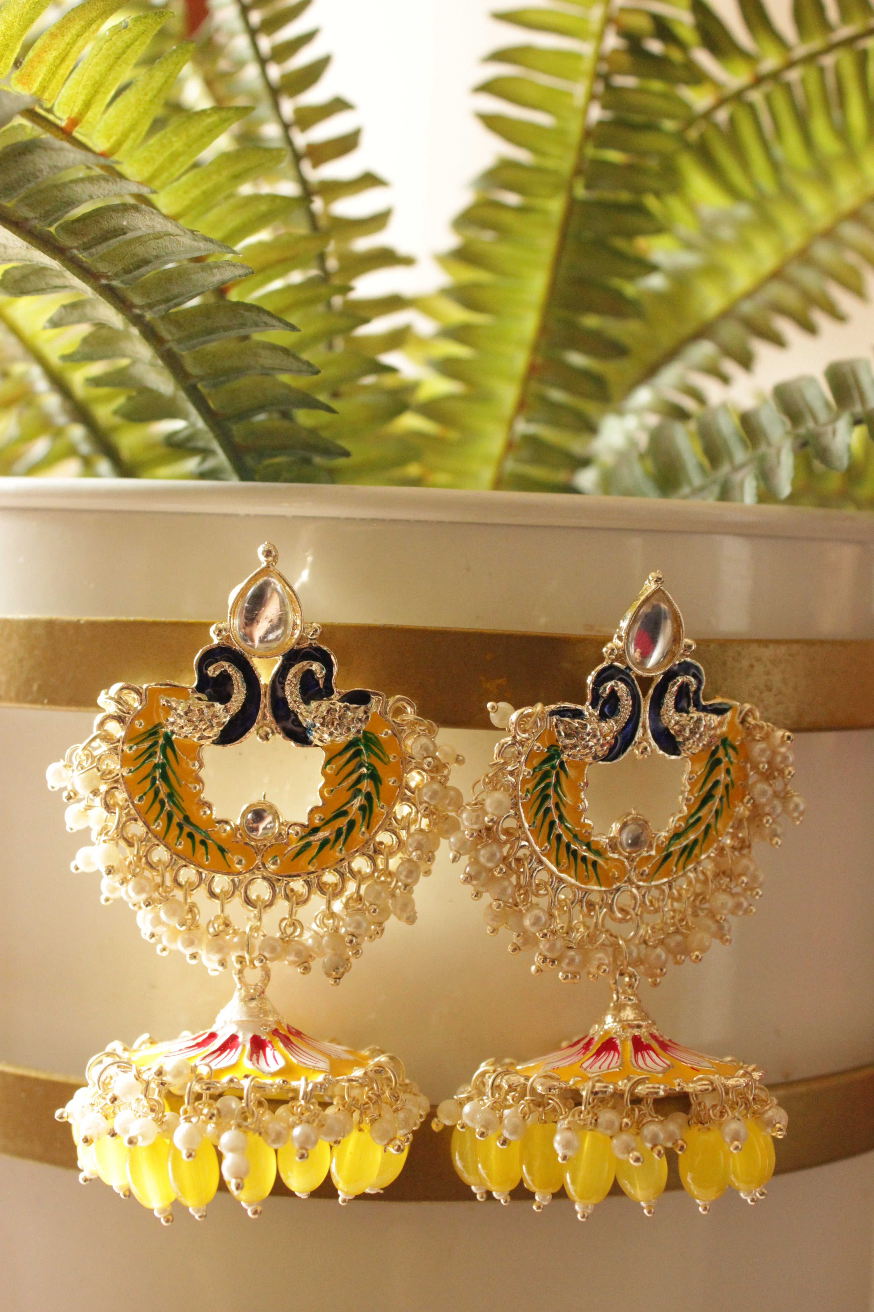 Bright Yellow Hand Painted Meenakari Work Statement Jhumka Earrings Accentuated with White and Yellow Beads
