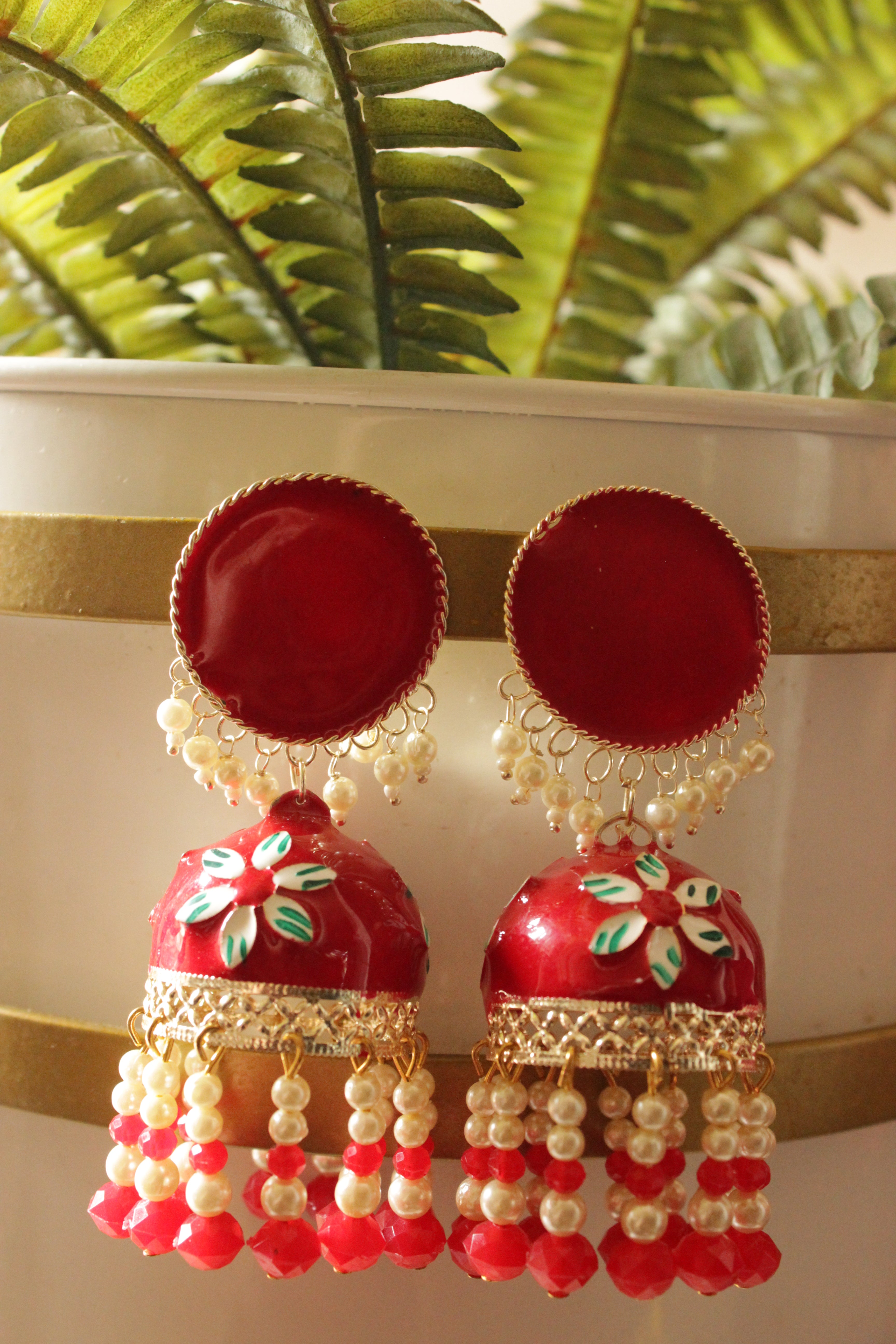 Vibrant Red Hand Painted Meenakari Work Gold Toned Hoop Jhumka Earrings Accentuated Stringed Beads Danglers