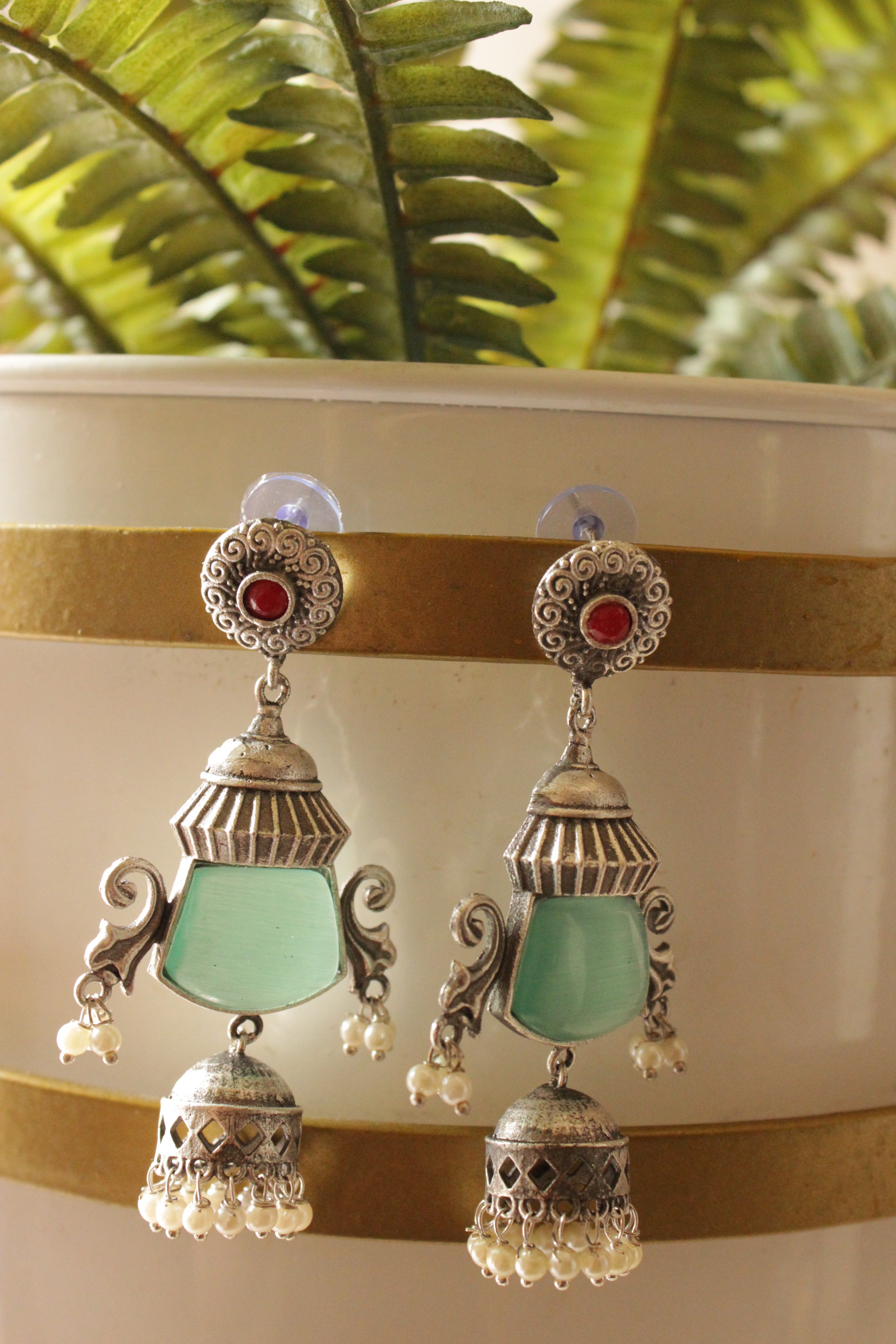 Turquoise Natural Gemstone Embedded Premium Silver Finish Dangler Jhumka Earrings