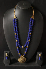 Load image into Gallery viewer, Royal Blue Fabric Beads Antique Gold Finish Religious Motif Pendant
