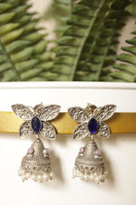 Load image into Gallery viewer, Purple Center Stone Silver Finish Butterfly Brass Jhumka Earrings
