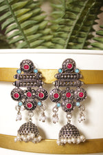 Load image into Gallery viewer, Pink &amp; Blue Glass Stones Embedded Oxidised Finish Dangler Jhumka Earrings
